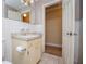 Bathroom with a single sink vanity, tiled floors and a toilet at 336 Burnt Hickory Rd, Powder Springs, GA 30127