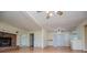 View of the living room with a fireplace, hardwood floors, and open doorway at 336 Burnt Hickory Rd, Powder Springs, GA 30127