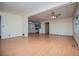 Open-concept living room featuring light-colored walls and laminate floors at 336 Burnt Hickory Rd, Powder Springs, GA 30127