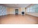 Spacious living room with hardwood floors, fireplace, built-in shelves and lots of light at 336 Burnt Hickory Rd, Powder Springs, GA 30127