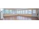 Bright sunroom with many windows, a fireplace, and an exterior door at 336 Burnt Hickory Rd, Powder Springs, GA 30127