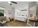 Neutral bedroom design with hardwood floors, a double window and a comfortable queen-sized bed at 94 Glenn Se St, Atlanta, GA 30312
