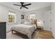 Bright bedroom features a ceiling fan, a double-hung window, and natural light at 94 Glenn Se St, Atlanta, GA 30312