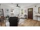 Cozy living room with hardwood floors, ample seating, and natural light from multiple windows at 94 Glenn Se St, Atlanta, GA 30312