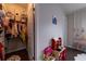 Walk-in closet with custom shelving and hanging rods for optimal storage at 10143 Windalier Way, Roswell, GA 30076