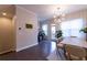 Elegant dining room with natural light, a large table, and stylish chairs at 10143 Windalier Way, Roswell, GA 30076