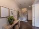 Bright foyer with hardwood floors, staircase, and stylish decor at 10143 Windalier Way, Roswell, GA 30076