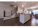 Modern kitchen featuring a stylish island with pendant lighting and sleek appliances at 10143 Windalier Way, Roswell, GA 30076