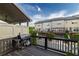 Relaxing outdoor deck with a built-in grill, perfect for entertaining with neighborhood views at 10143 Windalier Way, Roswell, GA 30076