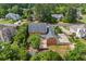 Aerial view of the home showcasing its expansive backyard and surrounding landscape at 1402 Bromley Dr, Snellville, GA 30078