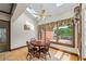 Charming breakfast nook with skylights, hardwood floors, and backyard views at 1402 Bromley Dr, Snellville, GA 30078