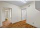 Hallway provides smooth transition to the bathroom and a glimpse of the well-lit interior at 1402 Bromley Dr, Snellville, GA 30078