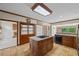Spacious kitchen with center island, stainless steel appliances, and tile flooring at 1402 Bromley Dr, Snellville, GA 30078