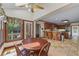 Open-concept kitchen with a cozy breakfast nook with views of the backyard deck at 1402 Bromley Dr, Snellville, GA 30078