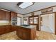 Gourmet kitchen with stainless steel appliances, gas cooktop, and granite countertops at 1402 Bromley Dr, Snellville, GA 30078