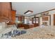 Granite countertops with stainless steel sink and gas cooktop on kitchen island at 1402 Bromley Dr, Snellville, GA 30078