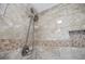 Tiled shower with dual heads, convenient niche, and elegant design details at 1402 Bromley Dr, Snellville, GA 30078