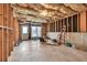 Unfinished basement ready for customization with an outside exit door at 1584 Heartland Path, Hoschton, GA 30548