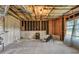 Unfinished basement with concrete floors and open ceiling with ready for customization at 1584 Heartland Path, Hoschton, GA 30548