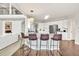 Modern kitchen with a large center island and stainless steel appliances at 1584 Heartland Path, Hoschton, GA 30548