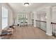 Bright loft with windows offering natural light and classic railings at 1584 Heartland Path, Hoschton, GA 30548