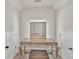 Elegant vanity area with stylish mirror and storage, perfect for getting ready at 1584 Heartland Path, Hoschton, GA 30548