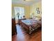 Comfortable bedroom with natural light, dressers, and decorative lamps at 162 Apple Valley Dr, Woodstock, GA 30188