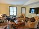 Cozy living room with a large window and comfortable seating arrangements at 162 Apple Valley Dr, Woodstock, GA 30188