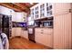 Farmhouse style kitchen featuring stainless steel appliances and wooden floors and countertops at 6980 Lamplighter Ln, Winston, GA 30187