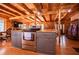 Open concept kitchen with stainless steel appliances and wooden floors and countertops at 6980 Lamplighter Ln, Winston, GA 30187