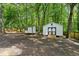 Fenced backyard with shed/outbuilding at 193 Cedar Creek Dr, Dallas, GA 30157