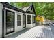 View of the backyard deck with black framed windows at 193 Cedar Creek Dr, Dallas, GA 30157