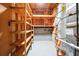 Basement with water heater and wooden shelves, provides additional storage space at 193 Cedar Creek Dr, Dallas, GA 30157