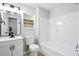 Clean white bathroom featuring modern fixtures, shower, and storage at 193 Cedar Creek Dr, Dallas, GA 30157