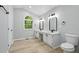 Bright bathroom featuring double sink vanity with modern fixtures at 193 Cedar Creek Dr, Dallas, GA 30157
