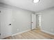 Spacious bedroom features neutral walls and wood look flooring at 193 Cedar Creek Dr, Dallas, GA 30157