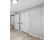 Bedroom features neutral walls, wood-look flooring and bright white doors at 193 Cedar Creek Dr, Dallas, GA 30157