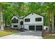 Charming two-story home with a two-car garage and neatly landscaped front yard at 193 Cedar Creek Dr, Dallas, GA 30157