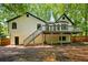 Back exterior view of the home, showing deck at 193 Cedar Creek Dr, Dallas, GA 30157