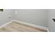 Bright laundry room featuring light wood-look floors and neutral walls, offering a clean and functional space at 193 Cedar Creek Dr, Dallas, GA 30157