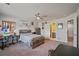 Spacious bedroom with study area and an ensuite bathroom at 317 Basel Way, Hampton, GA 30228