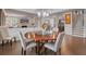 Open floor plan that connects the dining and living area at 317 Basel Way, Hampton, GA 30228