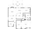 Detailed first floor plan showcasing the layout of the kitchen, living room, and bedrooms at 317 Basel Way, Hampton, GA 30228