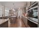 Well-equipped kitchen with granite countertops and stainless steel appliances is perfect for preparing delicious meals at 317 Basel Way, Hampton, GA 30228