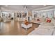 Open-concept living area seamlessly connects with the kitchen, creating an ideal space for entertaining at 317 Basel Way, Hampton, GA 30228