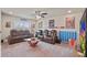 Spacious loft featuring plush seating, a ceiling fan, recessed lights, and a TV at 317 Basel Way, Hampton, GA 30228