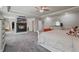 Bright main bedroom featuring fireplace, carpet flooring, and ensuite bathroom at 317 Basel Way, Hampton, GA 30228