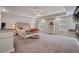 Large main bedroom with tray ceiling, fireplace, and plenty of natural light at 317 Basel Way, Hampton, GA 30228