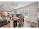 Bright office area with dual monitors and hardwood floors offering plenty of workspace at 317 Basel Way, Hampton, GA 30228
