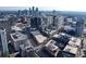 Overhead shot of urban center featuring modern high rises with a bustling city street at 3820 Roswell Ne Rd # 705, Atlanta, GA 30342